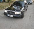 Чорний Мерседес В124, об'ємом двигуна 2.5 л та пробігом 425 тис. км за 1550 $, фото 1 на Automoto.ua
