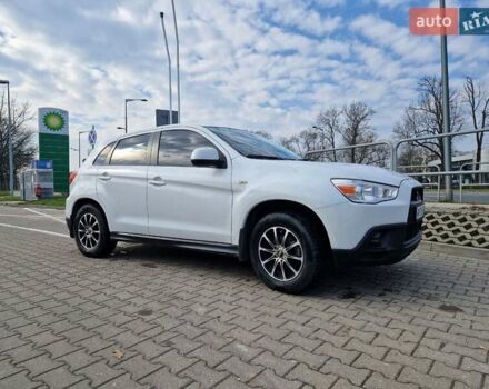 Белый Мицубиси АСХ, объемом двигателя 1.8 л и пробегом 146 тыс. км за 11184 $, фото 14 на Automoto.ua