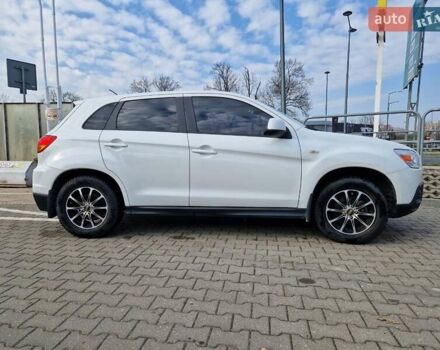 Белый Мицубиси АСХ, объемом двигателя 1.8 л и пробегом 146 тыс. км за 11184 $, фото 15 на Automoto.ua