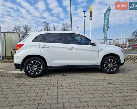 Белый Мицубиси АСХ, объемом двигателя 1.8 л и пробегом 146 тыс. км за 11184 $, фото 16 на Automoto.ua