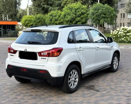 Белый Мицубиси АСХ, объемом двигателя 1.8 л и пробегом 206 тыс. км за 8800 $, фото 5 на Automoto.ua