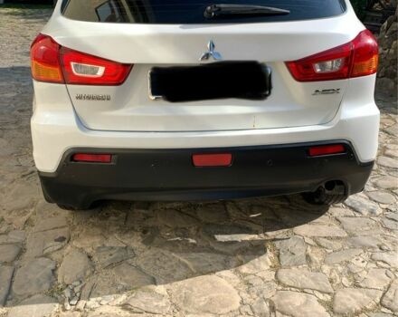 Белый Мицубиси АСХ, объемом двигателя 1.8 л и пробегом 150 тыс. км за 9700 $, фото 8 на Automoto.ua