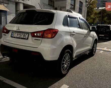 Белый Мицубиси АСХ, объемом двигателя 1.6 л и пробегом 165 тыс. км за 8700 $, фото 6 на Automoto.ua