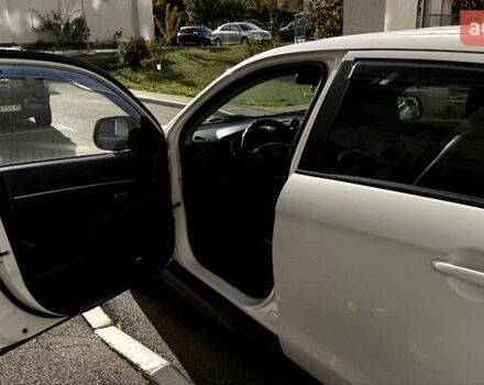 Белый Мицубиси АСХ, объемом двигателя 1.6 л и пробегом 165 тыс. км за 8700 $, фото 11 на Automoto.ua