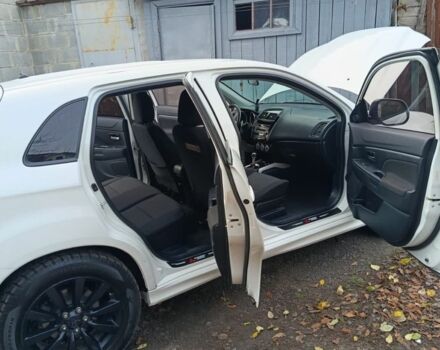 Белый Мицубиси АСХ, объемом двигателя 2 л и пробегом 171 тыс. км за 11539 $, фото 20 на Automoto.ua