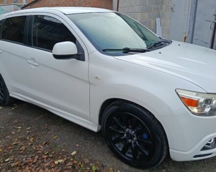 Белый Мицубиси АСХ, объемом двигателя 2 л и пробегом 171 тыс. км за 11539 $, фото 1 на Automoto.ua