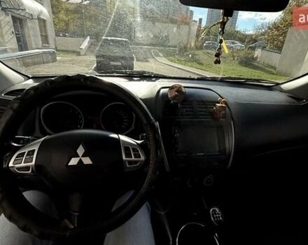 Белый Мицубиси АСХ, объемом двигателя 1.6 л и пробегом 165 тыс. км за 8700 $, фото 14 на Automoto.ua