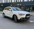 Белый Мицубиси АСХ, объемом двигателя 2 л и пробегом 240 тыс. км за 10000 $, фото 1 на Automoto.ua