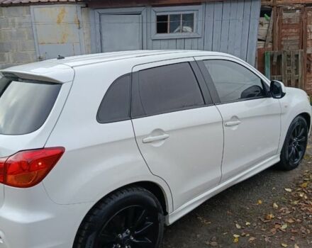 Белый Мицубиси АСХ, объемом двигателя 2 л и пробегом 171 тыс. км за 11539 $, фото 2 на Automoto.ua