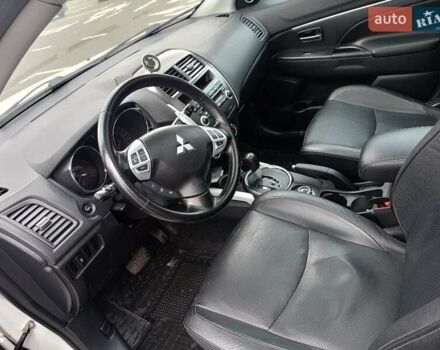 Белый Мицубиси АСХ, объемом двигателя 2 л и пробегом 163 тыс. км за 11700 $, фото 13 на Automoto.ua