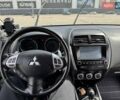 Белый Мицубиси АСХ, объемом двигателя 2 л и пробегом 205 тыс. км за 11200 $, фото 18 на Automoto.ua