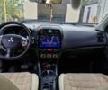 Белый Мицубиси АСХ, объемом двигателя 2 л и пробегом 138 тыс. км за 10200 $, фото 6 на Automoto.ua