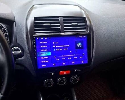 Белый Мицубиси АСХ, объемом двигателя 2 л и пробегом 115 тыс. км за 9800 $, фото 1 на Automoto.ua