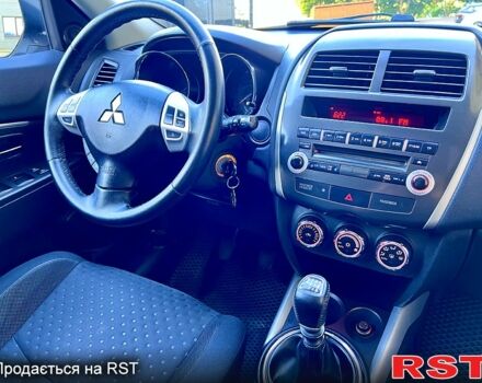 Белый Мицубиси АСХ, объемом двигателя 1.8 л и пробегом 162 тыс. км за 9499 $, фото 4 на Automoto.ua