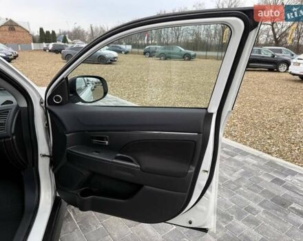 Белый Мицубиси АСХ, объемом двигателя 1.8 л и пробегом 205 тыс. км за 11599 $, фото 20 на Automoto.ua