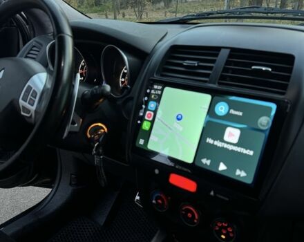 Белый Мицубиси АСХ, объемом двигателя 2 л и пробегом 249 тыс. км за 9200 $, фото 8 на Automoto.ua