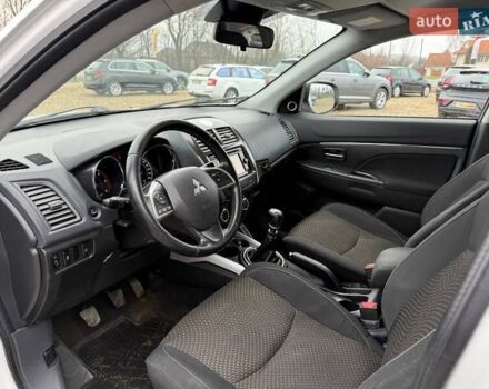 Белый Мицубиси АСХ, объемом двигателя 1.8 л и пробегом 205 тыс. км за 11599 $, фото 9 на Automoto.ua