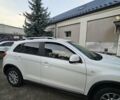 Белый Мицубиси АСХ, объемом двигателя 1.59 л и пробегом 156 тыс. км за 12000 $, фото 5 на Automoto.ua