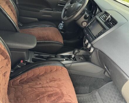 Белый Мицубиси АСХ, объемом двигателя 2 л и пробегом 112 тыс. км за 16300 $, фото 3 на Automoto.ua