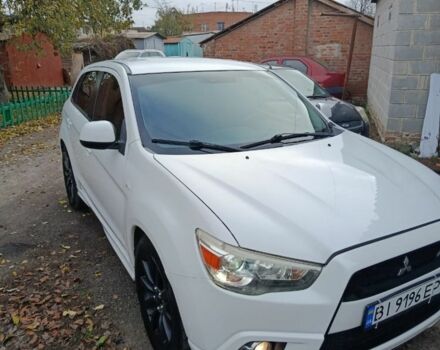 Белый Мицубиси АСХ, объемом двигателя 2 л и пробегом 171 тыс. км за 11539 $, фото 1 на Automoto.ua