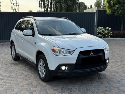 Белый Мицубиси АСХ, объемом двигателя 1.8 л и пробегом 206 тыс. км за 8800 $, фото 1 на Automoto.ua