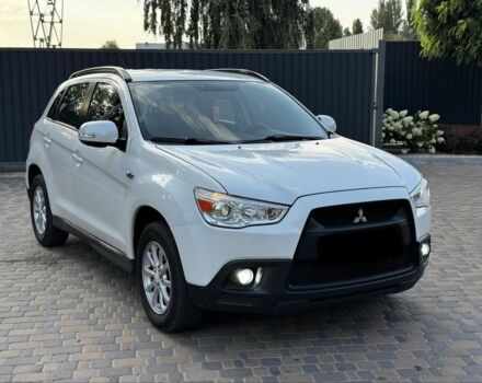 Белый Мицубиси АСХ, объемом двигателя 1.8 л и пробегом 206 тыс. км за 8800 $, фото 1 на Automoto.ua
