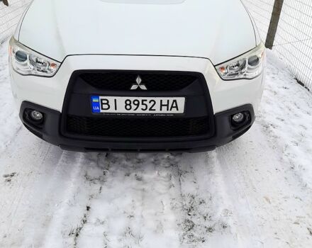 Белый Мицубиси АСХ, объемом двигателя 1.8 л и пробегом 160 тыс. км за 11600 $, фото 1 на Automoto.ua