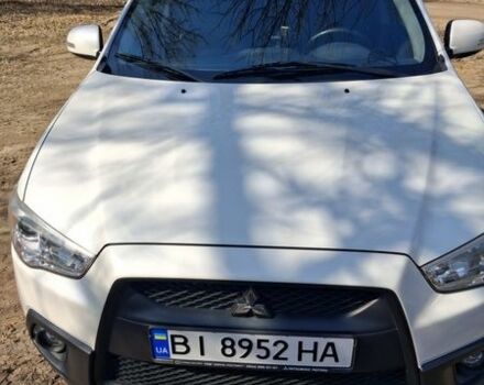 Белый Мицубиси АСХ, объемом двигателя 1.8 л и пробегом 163 тыс. км за 11500 $, фото 1 на Automoto.ua