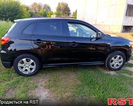 Черный Мицубиси АСХ, объемом двигателя 1.8 л и пробегом 155 тыс. км за 9700 $, фото 3 на Automoto.ua