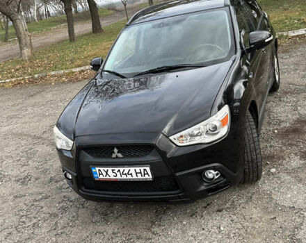 Черный Мицубиси АСХ, объемом двигателя 1.8 л и пробегом 150 тыс. км за 7800 $, фото 3 на Automoto.ua