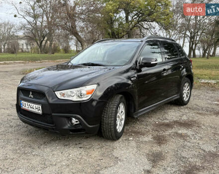 Черный Мицубиси АСХ, объемом двигателя 1.8 л и пробегом 150 тыс. км за 7800 $, фото 1 на Automoto.ua