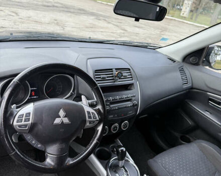 Черный Мицубиси АСХ, объемом двигателя 1.8 л и пробегом 150 тыс. км за 7800 $, фото 17 на Automoto.ua