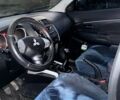 Черный Мицубиси АСХ, объемом двигателя 1.59 л и пробегом 203 тыс. км за 9600 $, фото 1 на Automoto.ua