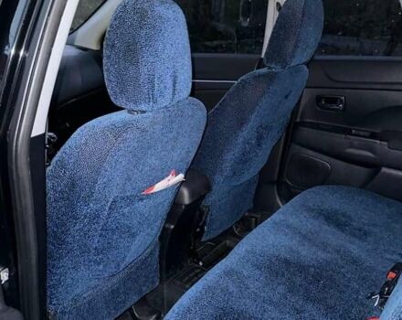 Черный Мицубиси АСХ, объемом двигателя 1.59 л и пробегом 203 тыс. км за 9600 $, фото 3 на Automoto.ua