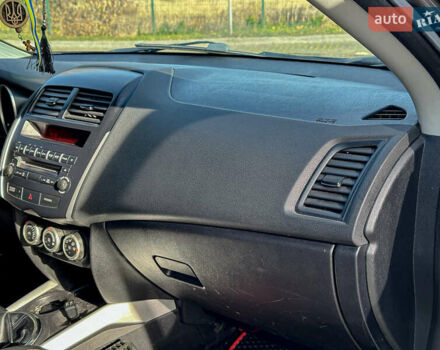 Черный Мицубиси АСХ, объемом двигателя 1.8 л и пробегом 253 тыс. км за 8200 $, фото 87 на Automoto.ua