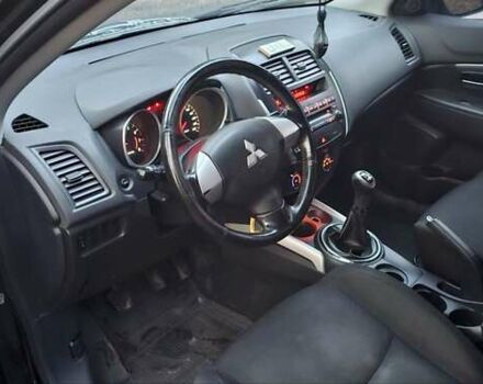 Черный Мицубиси АСХ, объемом двигателя 1.59 л и пробегом 226 тыс. км за 8700 $, фото 7 на Automoto.ua