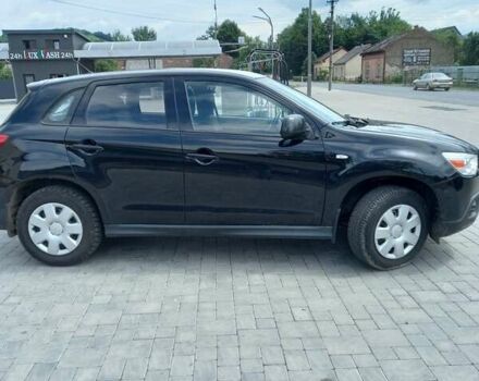 Черный Мицубиси АСХ, объемом двигателя 1.59 л и пробегом 200 тыс. км за 8300 $, фото 2 на Automoto.ua