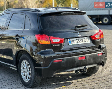 Черный Мицубиси АСХ, объемом двигателя 1.8 л и пробегом 253 тыс. км за 8200 $, фото 31 на Automoto.ua
