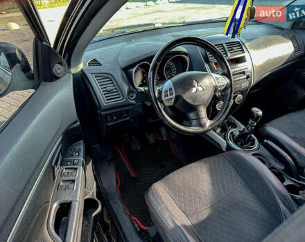 Черный Мицубиси АСХ, объемом двигателя 1.8 л и пробегом 253 тыс. км за 8200 $, фото 52 на Automoto.ua