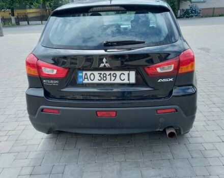 Черный Мицубиси АСХ, объемом двигателя 1.59 л и пробегом 200 тыс. км за 8300 $, фото 1 на Automoto.ua