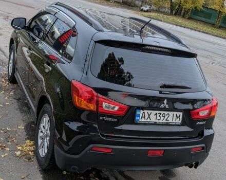 Черный Мицубиси АСХ, объемом двигателя 1.8 л и пробегом 140 тыс. км за 11200 $, фото 2 на Automoto.ua