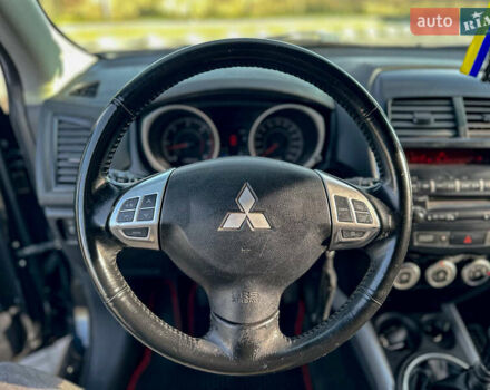 Черный Мицубиси АСХ, объемом двигателя 1.8 л и пробегом 253 тыс. км за 8200 $, фото 61 на Automoto.ua