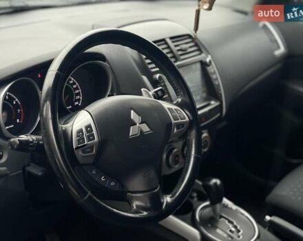 Черный Мицубиси АСХ, объемом двигателя 1.8 л и пробегом 138 тыс. км за 10900 $, фото 7 на Automoto.ua
