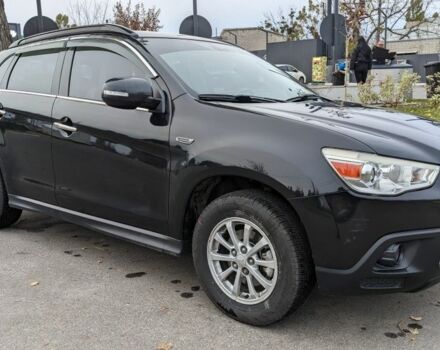 Черный Мицубиси АСХ, объемом двигателя 1.8 л и пробегом 140 тыс. км за 11200 $, фото 3 на Automoto.ua