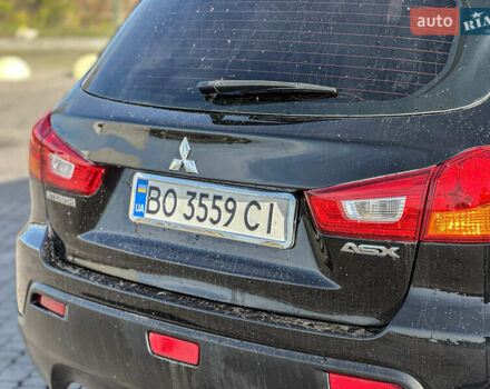 Черный Мицубиси АСХ, объемом двигателя 1.8 л и пробегом 253 тыс. км за 8200 $, фото 46 на Automoto.ua