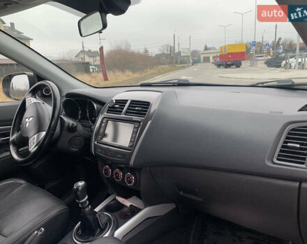 Черный Мицубиси АСХ, объемом двигателя 1.8 л и пробегом 223 тыс. км за 10800 $, фото 15 на Automoto.ua