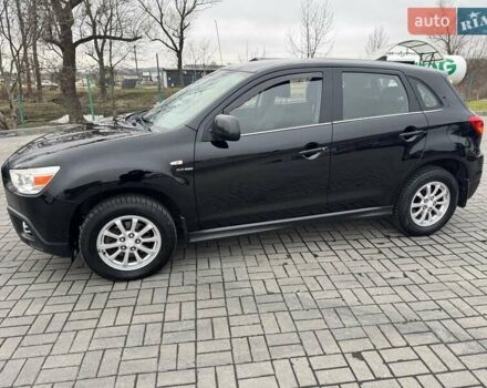 Черный Мицубиси АСХ, объемом двигателя 1.8 л и пробегом 225 тыс. км за 9500 $, фото 1 на Automoto.ua