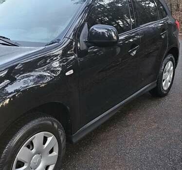 Черный Мицубиси АСХ, объемом двигателя 1.59 л и пробегом 226 тыс. км за 8700 $, фото 2 на Automoto.ua