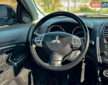Черный Мицубиси АСХ, объемом двигателя 1.8 л и пробегом 253 тыс. км за 8200 $, фото 77 на Automoto.ua
