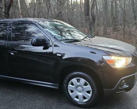 Черный Мицубиси АСХ, объемом двигателя 1.59 л и пробегом 226 тыс. км за 8700 $, фото 1 на Automoto.ua